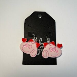 Girl snoopy dog earrings.